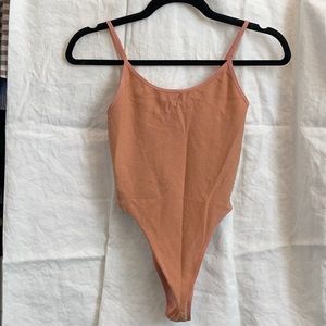 Small sparkly peach and gold bodysuit